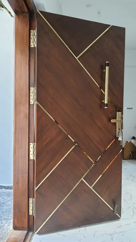 WPC door with brass inlay lines